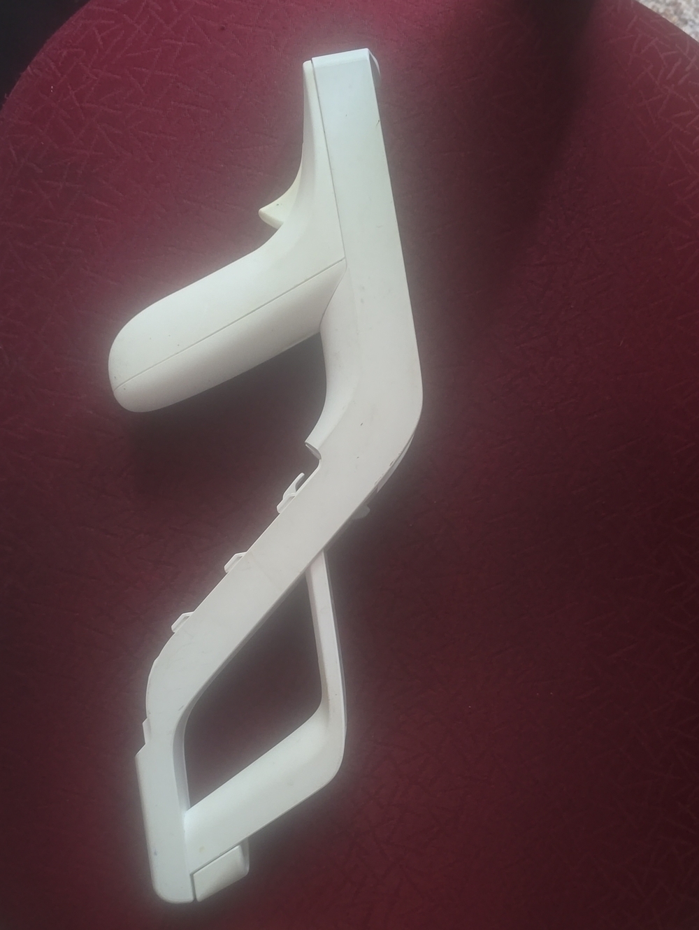 official Nintendo Wii Zapper accessory (model RVL-023).
